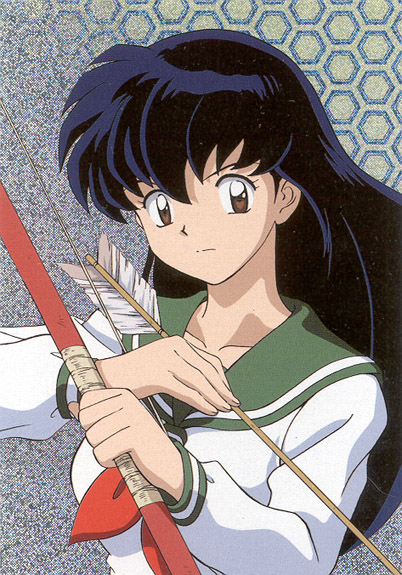 Striking a pose with her archery weapons